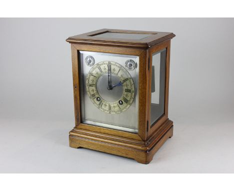 An early 20th century Winter-Halder and Hofmier mantle clock the silverised dial with Roman numerals and two subsidiary dials