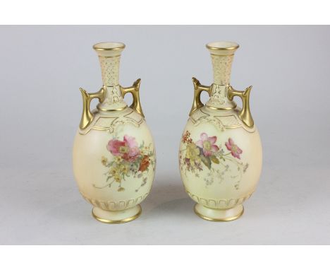 A pair of Royal Worcester porcelain blush bottleneck vases with hand painted floral decoration and gilt embellishment, 18cm h