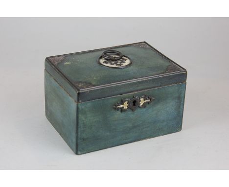 A 19th century green stained wooden tea caddy with central circular handle, the interior with single galvanised well and cove