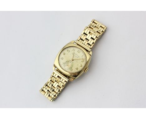 A 9ct gold wrist watch by Zenith on a gilt bracelet, London import mark for 1951