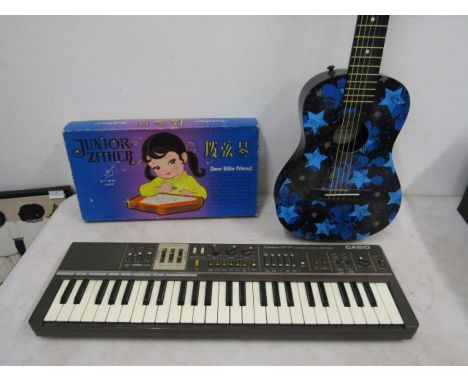 Kids guitar, casio keyboard and a junior zithor