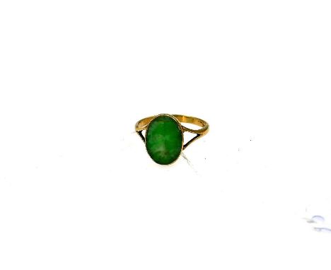 9ct gold ring with an oval carved green Jade size R