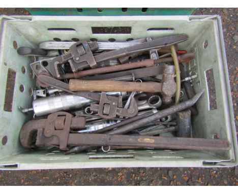 Crate of tools to include adjustable wrenches and hammer etc