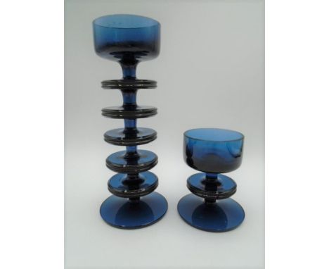 2 Wedgwood Sheringham blue candle holders designed by Ronald Stennett Wilson comprising of a five ring holder 20cm tall and o