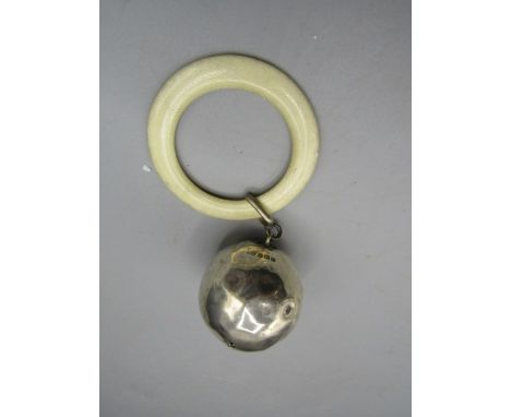 A silver bell and teething ring- hallmarked