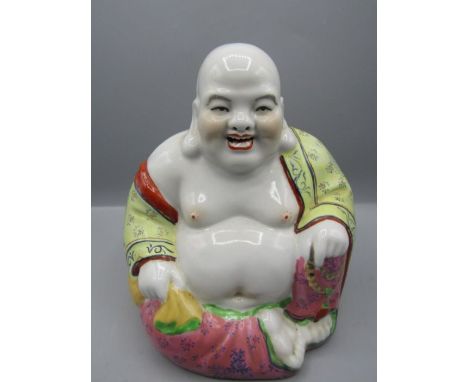 A Chinese ceramic Buddha 21cmH