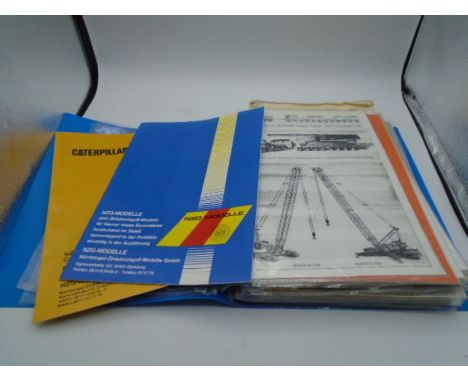 Folder of collectors scale model catalogues and price lists to incl NZG, Conrad etc (mainly from the 90's)