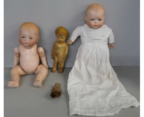 Two bisque dolls, Armand Marseille and Huebach Köppelsdorf, both with sleep eyes (one with jointed limbs, other with soft bod