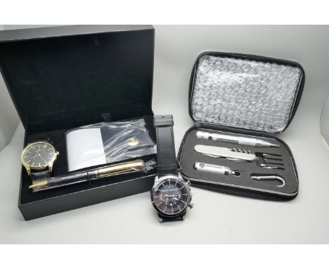 A boxed Phillipe Reveur wristwatch, pen and wallet set, a Daniel Hechter wristwatch and an Antaris tool set