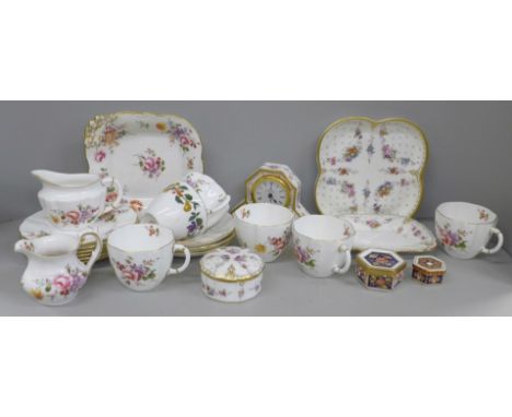 A collection of Royal Crown Derby; Royal Antoinette - clock, two dishes and a trinket box, also Derby Posies - cups, saucers,
