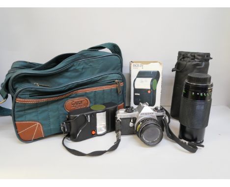 A Pentax ME Super 35mm camera with Asahi lens, one other lens, a flash and soft case