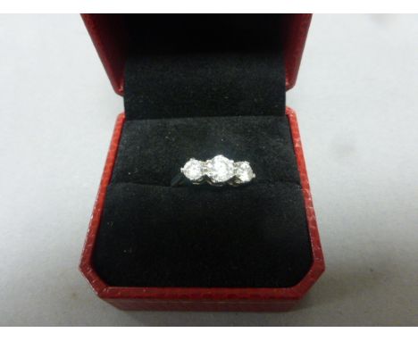 An 18ct white gold three stone diamond ring of 1.44ct's