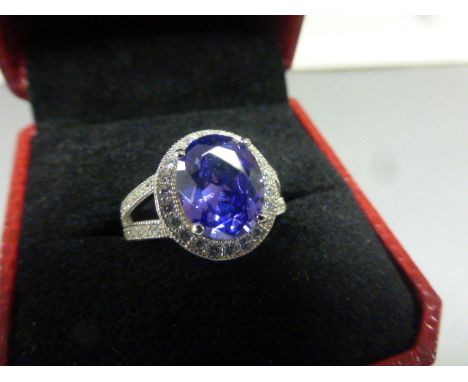 A silver, CZ & amethyst set dress ring