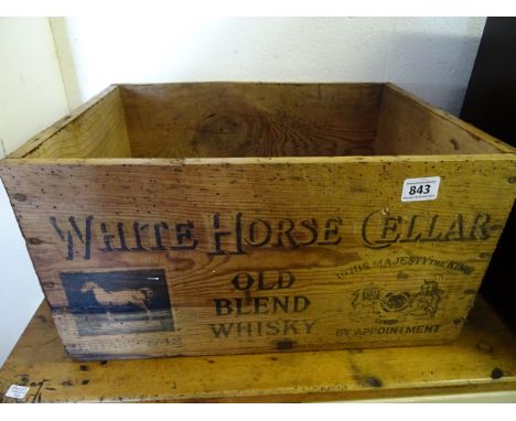 Vintage pine box with 'White Horse Cellar' advertising