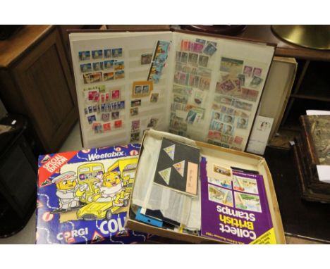 Mixed collectables including a stamp album, boxed Corgi Weetabix set etc