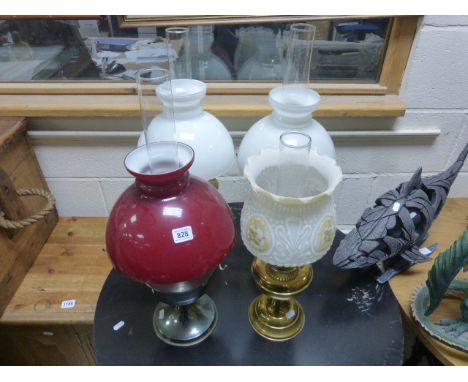 Three Brass Oil Lamps with Glass Shades and another Oil Lamp with Red Glass Shade