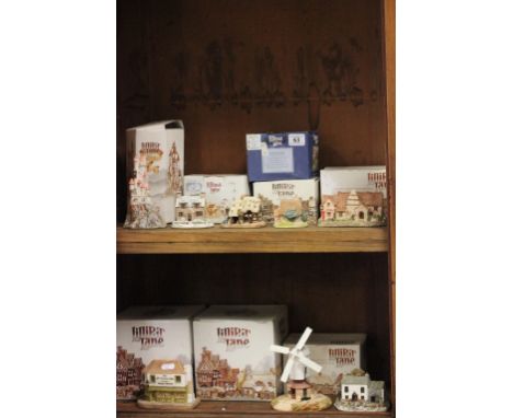Collection of Eight Boxed Lilliput Lane Cottages including Red Knight Castle, Old Curiosity Shop with Deeds, Ladybird Cottage