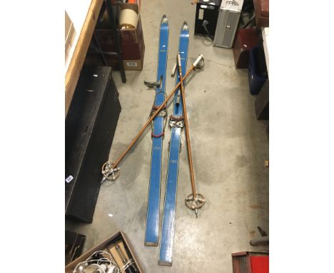 A pair of vintage snow skis & sticks by Sturtzhahn of Austria