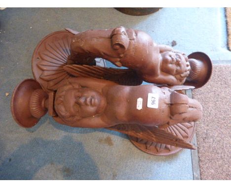 Pair heavy cast wall planter, decorated with cherubs