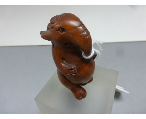 A Japanese carved netsuke of an elephant