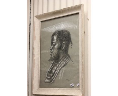 20th Century School - a framed pastel portrait of an African tribesman.  Signed & dated