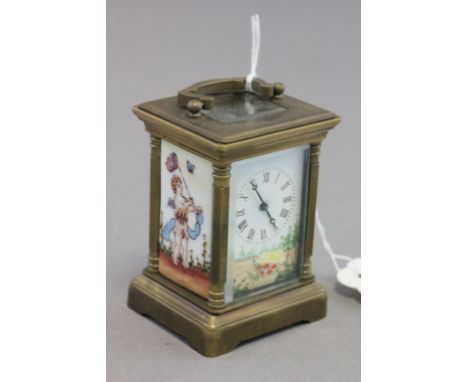 Miniature brass cased carriage clock with porcelain panels 