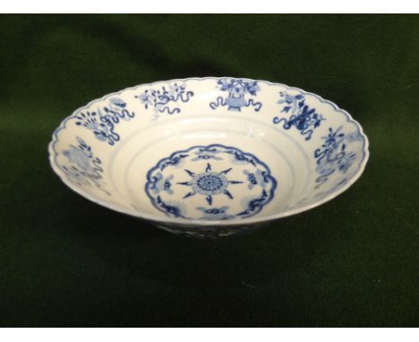 Chinese blue and white bowl, painted to the interior with Buddhist emblems and the exterior with flower scroll and bats, Yong