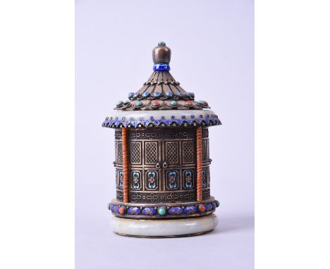 Chinese gilt-silver enamel lidded box inlaid with turquoise and agate and mounted with a couple of jade bangles, 14cm high. 