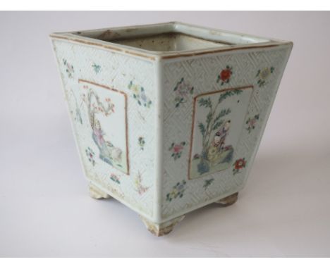 Early C19th Chinese porcelain planter of square section, the sides with four figural panels on a moulded ground painted with 