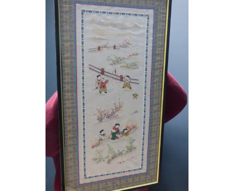 C20th framed Chinese embroidered silk panel, depicting two boys playing