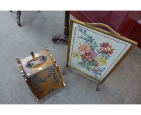 A Victorian oak coal scuttle and fire screen