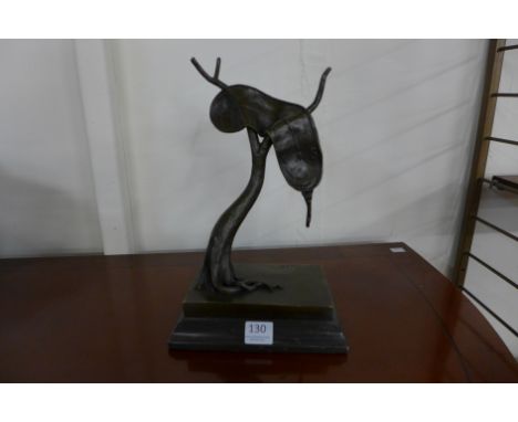 Manner of Salvador Dali, bronze abstract, on black marble socle