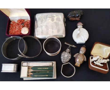 A collection of various items to include, a hallmarked silver cigarette case, a hallmarked silver napkin ring, two bangles st