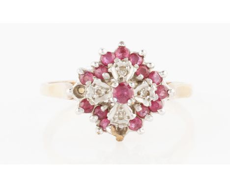 A 9ct yellow gold ruby and diamond cluster design ring, hallmarked Birmingham 1985, ring size Q, (A/F two stones deficient).