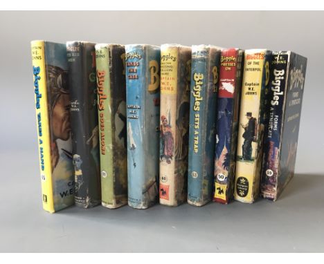 Nine First Edition Biggles books by Captain W.E. Johns including Biggles Takes a Hand, Biggles Goes Alone, Biggles Gets his M