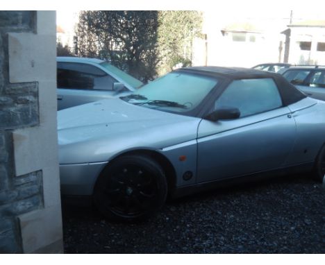 1997 Alfa Romeo Spider Convertible. Reg. no. R301 EOX. Chassis no. ZAR91600006041623. Engine no. Unknown. The Alfa Romeo Spid