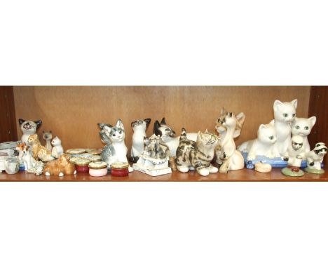 A Winstanley ceramic kitten, crouching, No.1, 10.5cm high and a collection of various cat and animal figures.