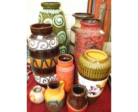 A collection of six W Germany decorated ceramic vases, tallest 48cm, a Scheurich jug, 16.5cm high and two other vases.