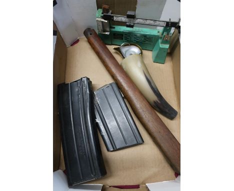 RCBS 5-10 scale powder measure, a 7.62mm magazine, another magazine, a forend and powder horn 