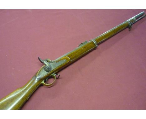 Tower percussion cap two banded rifle with 32 1/2 inch rifle barrel, with fixed foresights and adjustable rear ladder sights,