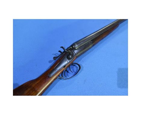 12 bore hammer gun with 28 1/4 inch barrels, no visible maker, serial no. 22870 (Shotgun certificate required)