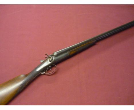 T.Wild 12 bore hammer gun with 30 inch barrels and 14 1/4 inch straight through stock, serial no. 15974 (shotgun certificate 