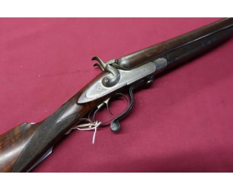12B side by side under lever opening hammer gun, with 30 inch brown damascus barrels, serial no. NVN&nbsp;(RFD only)