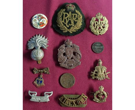 Selection of various British military cap badges and shoulder titles including RAF, Royal Ordnance Corp, Army Cyclist Corp, t