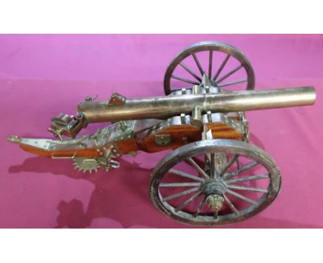 Well made brass scale model of a breach loading field gun (barrel length 40cm) (trunnions  bored through) 