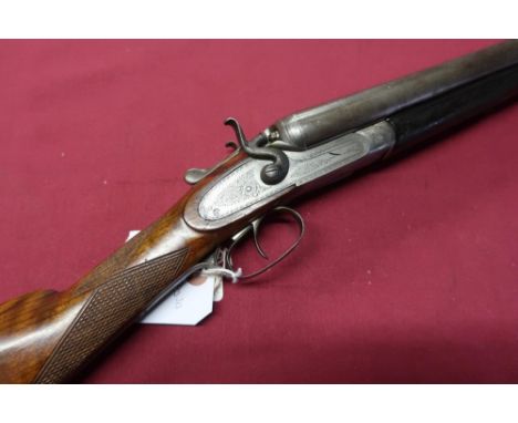 W. P. Jones 20B side by side hammer gun, with 26 3/4 inch Damascus barrels, with engraved detail to the top rib, serial no. 1