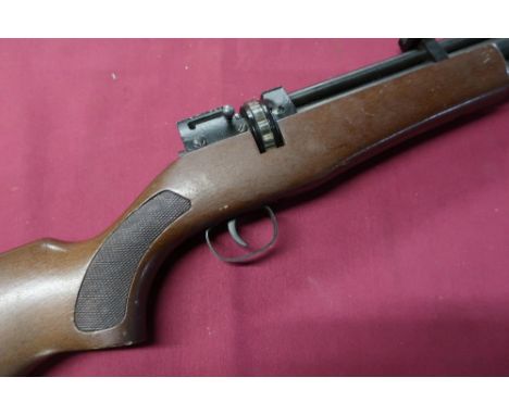 Vintage .22 under lever air rifle with magazine 