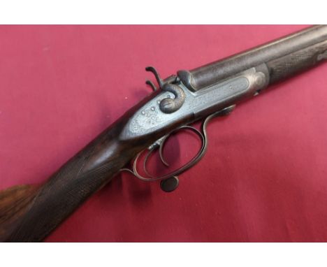 14 bore side by side hammer gun with 28.5" barrels with 14 bore chambers, under lever opening, makers Reilly serial number 13