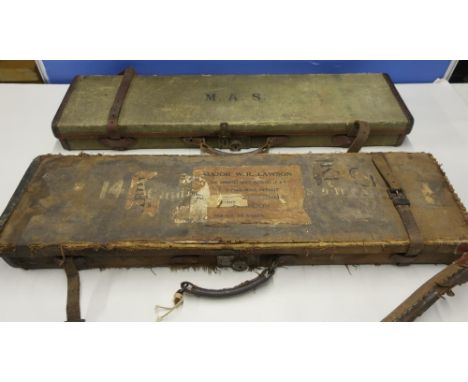 Two vintage canvas and leather trimmed gun cases 