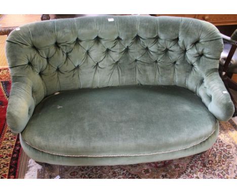 A button back green velour upholstered two seater sofa, c.1900, 130cm wide&nbsp;